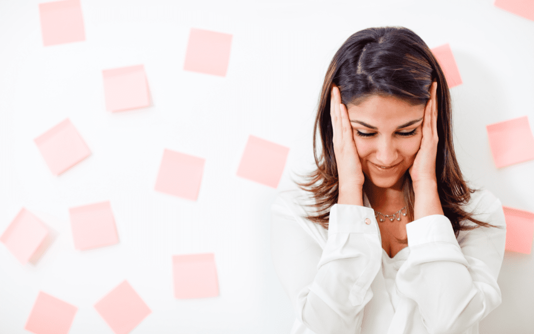 Woman with too many to do notes